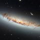 Illustration for article titled Mangled Galaxies Racing At Over 6 Million Miles Per Hour